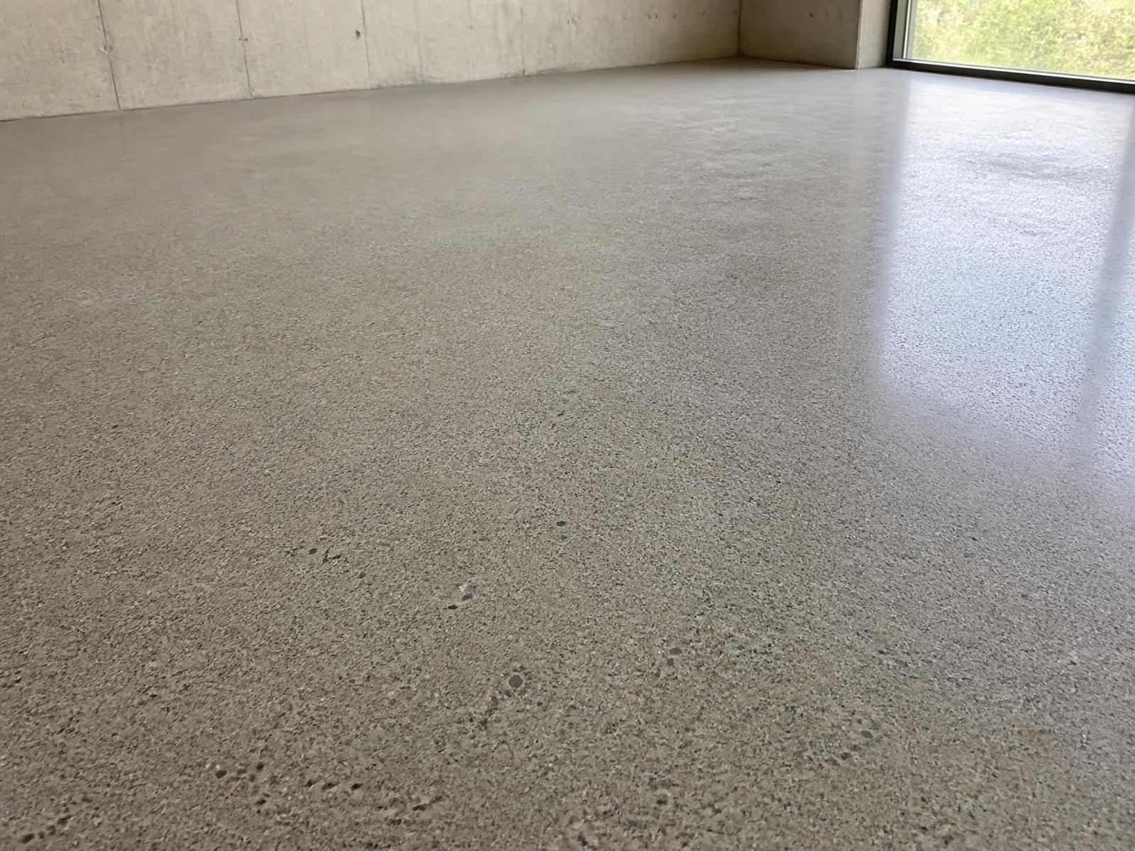 The same interior floor after grinding and honing to an even matte surface