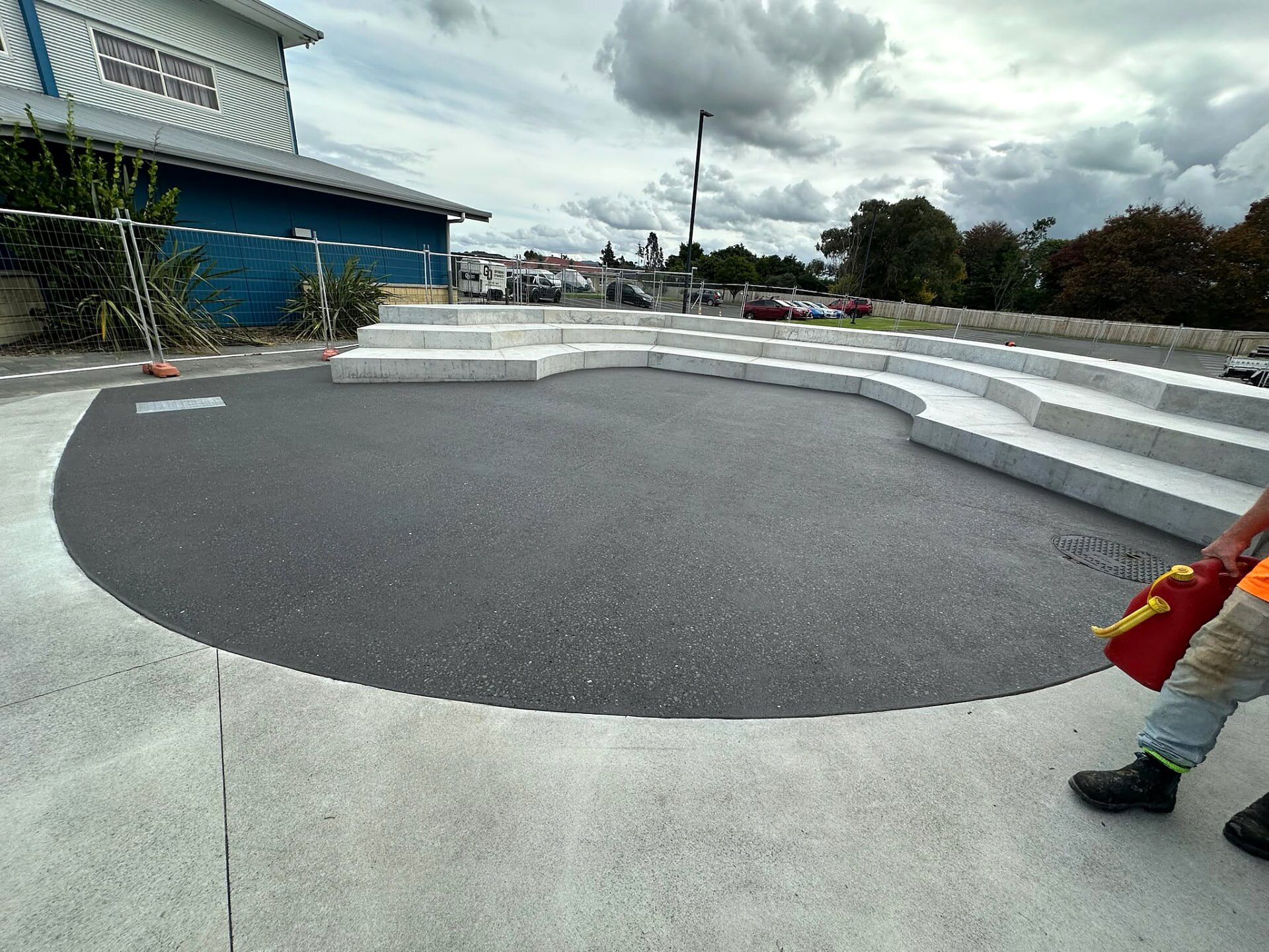 Textured non slip concrete plaza with curved steps